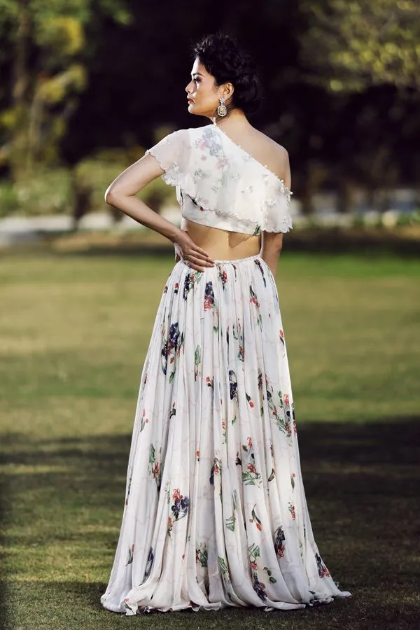 One off-shoulder Ivory lehenga set